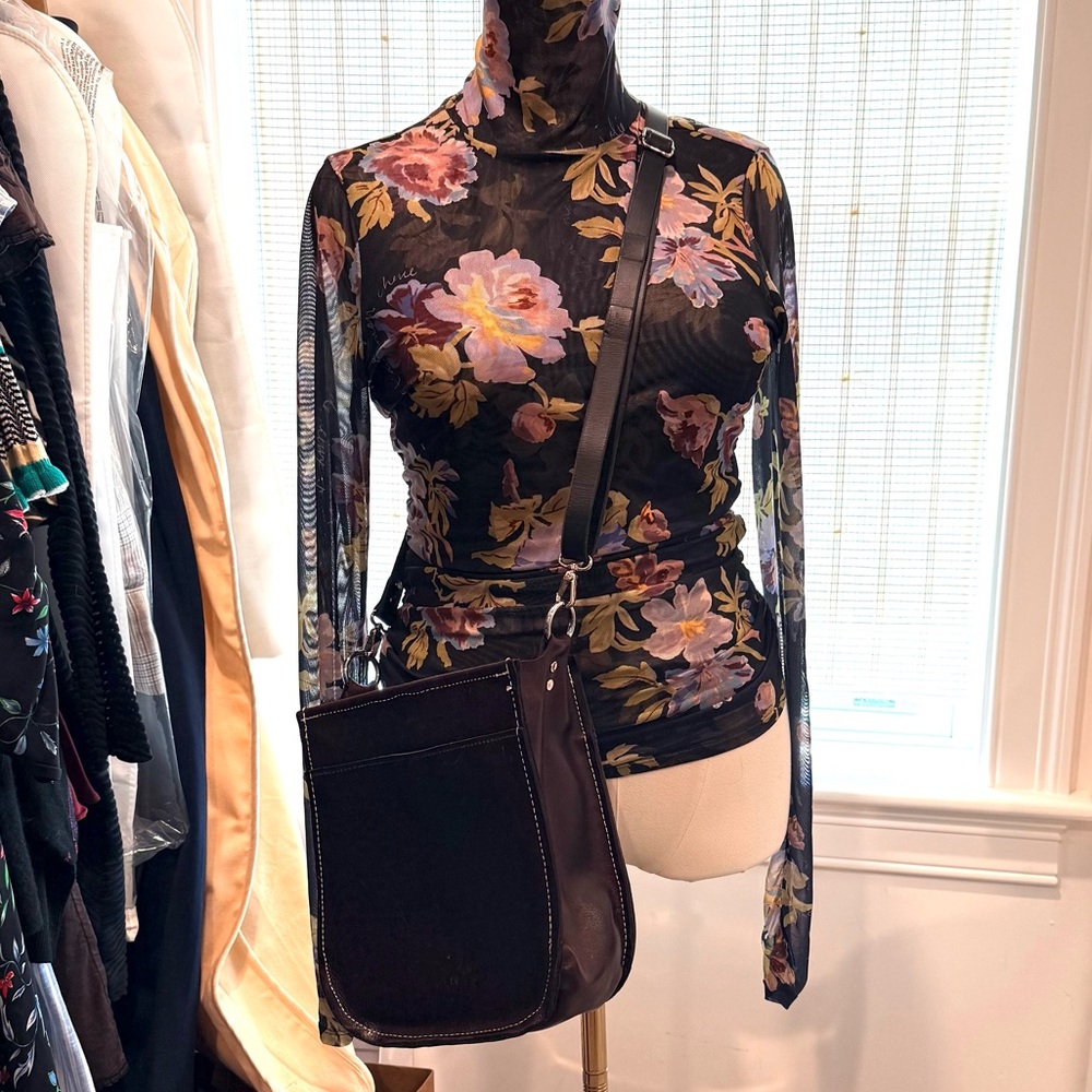Brown leather saddle bag